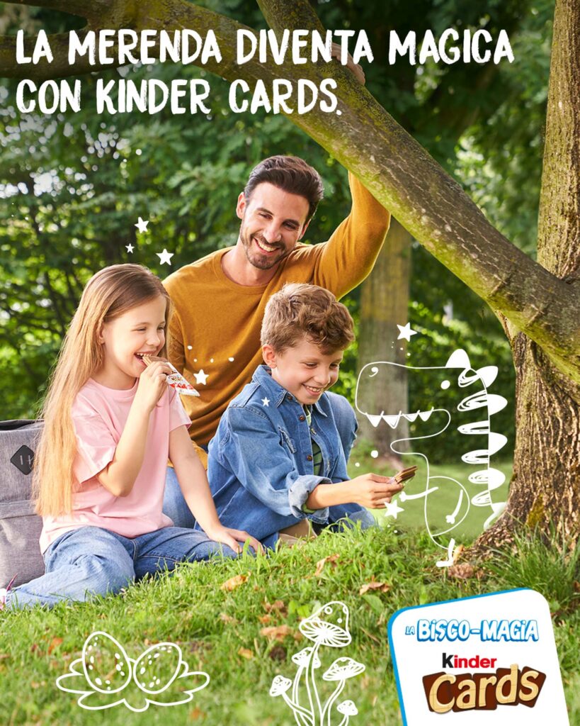 A father and two children enjoying Kinder Cards outdoors with playful illustrations enhancing the magical snack time